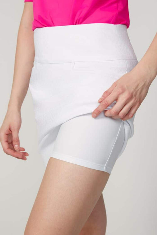 SOLID TEXTURED TECHNO JACQUARD VENTED SKORT | SWING CONTROL